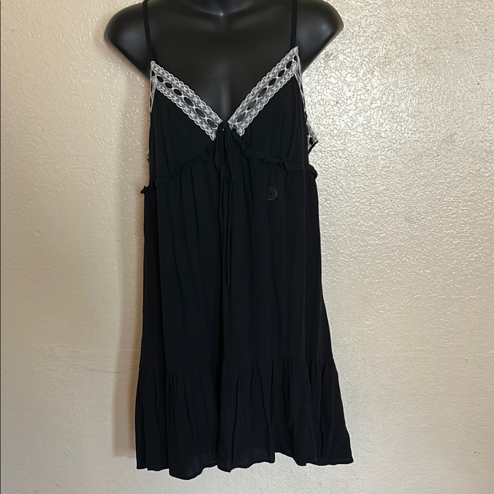 Black Sleeveless Dress with White Lace Trim